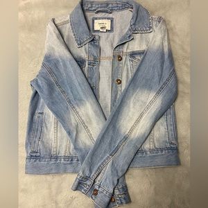 Denim jacket, button up, casual. Great condition, like new. No holes.